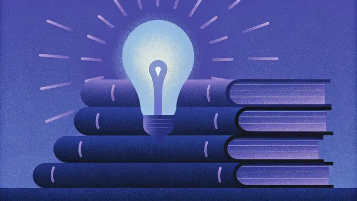 Ampoule lumineuse posée sur une pile de livres, l'imagination plus importante que la connaissance